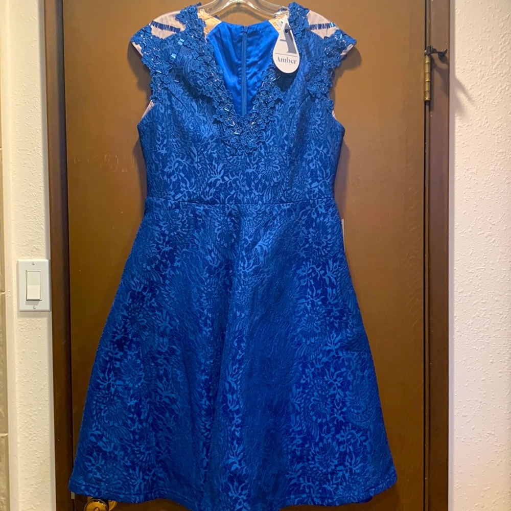 Blue lace dress by Amber